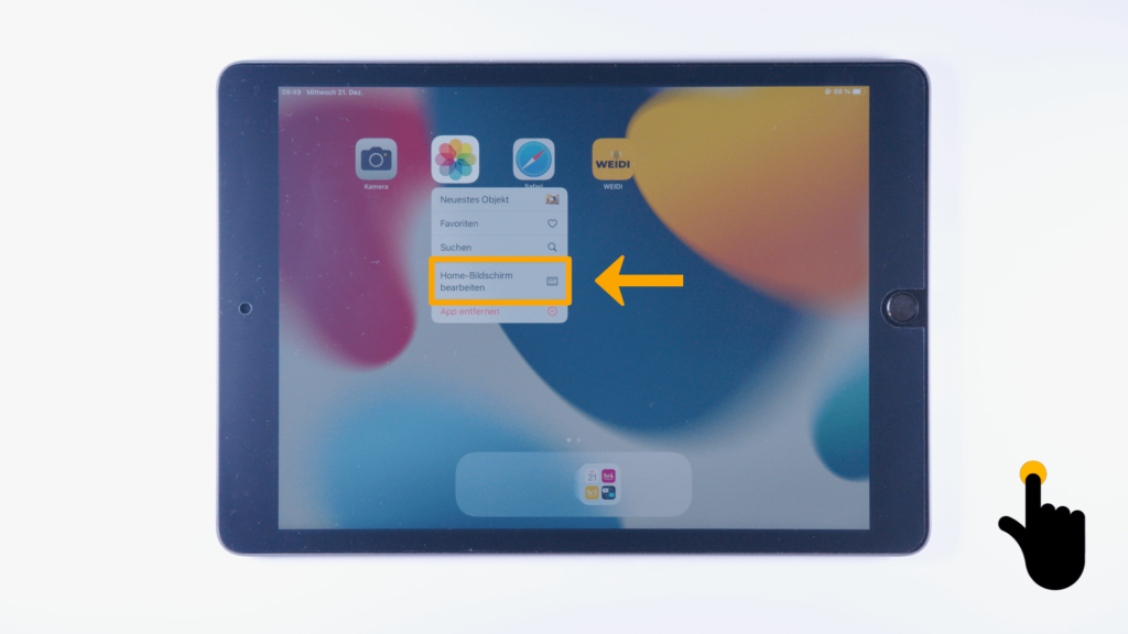 iPad: Startbildschirm. Ein Fenster ist geöffnet. Darauf sind mehre Optionen zu sehen. Homebildschirm bearbeiten ist mit einem Kästchen und Pfeil hervorgehoben.