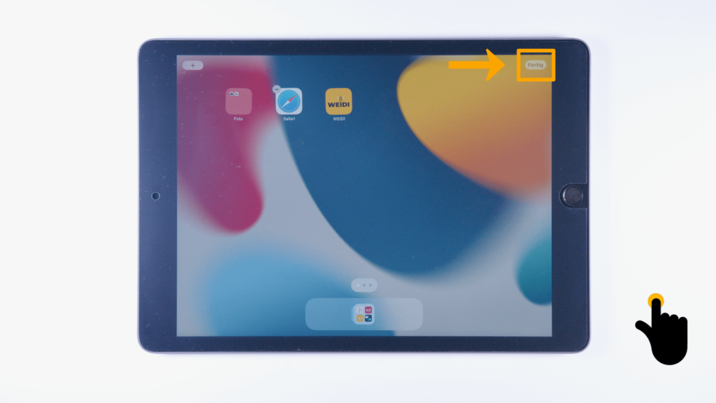 iPad: Startbildschirm. Der Button auf dem Bildschirm "Fertig" ist mit einem Kästchen und einem Pfeil hervorgehoben.