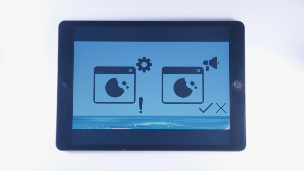 (iPad:) Grafik Technischer Cookie: Ausrufezeichen rechts daneben; linke Bildschirmhälfte Grafik Werbe Cookie: Haken + Kreuz rechts daneben; rechte Bildschirmhälfte