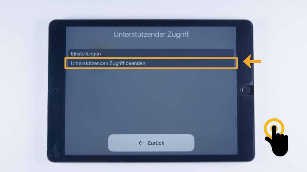 Tablet zeigt dieselbe graue Oberfläche wie zuvor, diesmal ist „Unterstützenden Zugriff beenden“ markiert, daneben ein Fingertipp-Symbol.